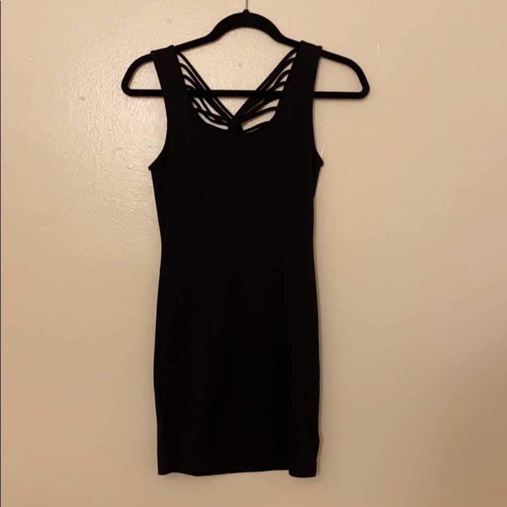Black fitted dress with detail in the back